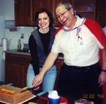 steve and westi cutting birthday cake